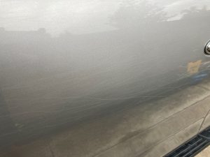  “Close-up of a scratched car before polishing, taken on the Gold Coast.”