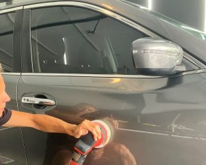 Applying paint protection to a car on the Gold Coast